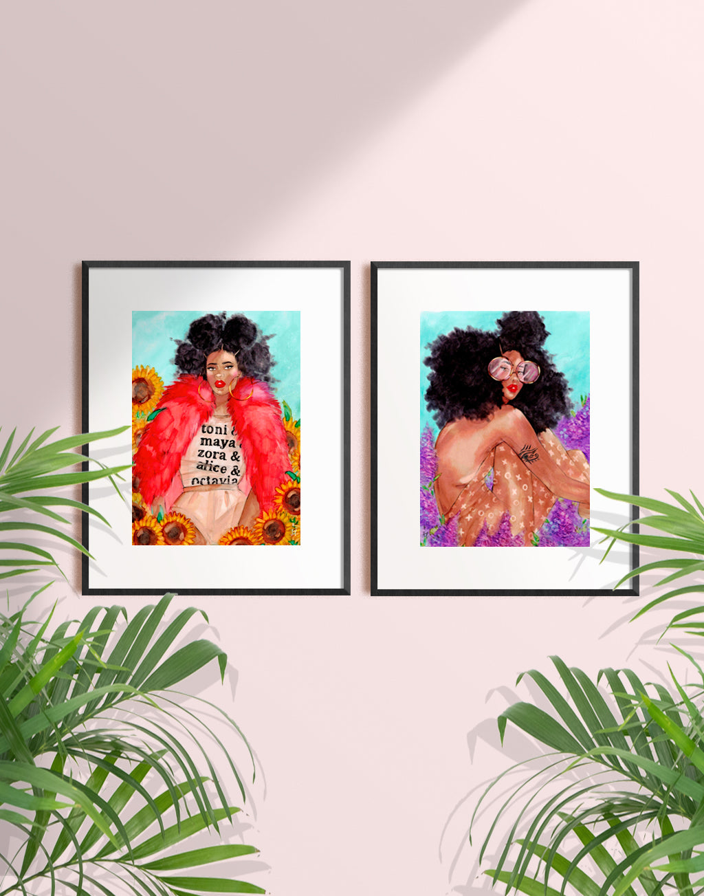 Two framed illustrations of beautiful black women with big curly natural hair sitting among flowers by Tatiana Poblah