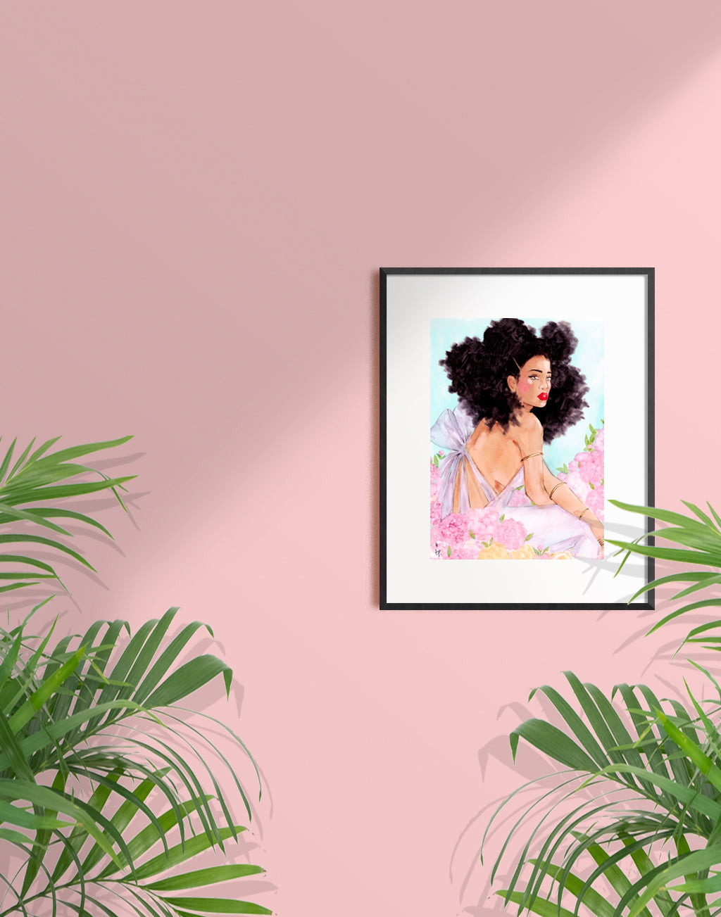 Woman with big curly hair sitting in a field of peonies in a black frame with a white mat by Tatiana Poblah